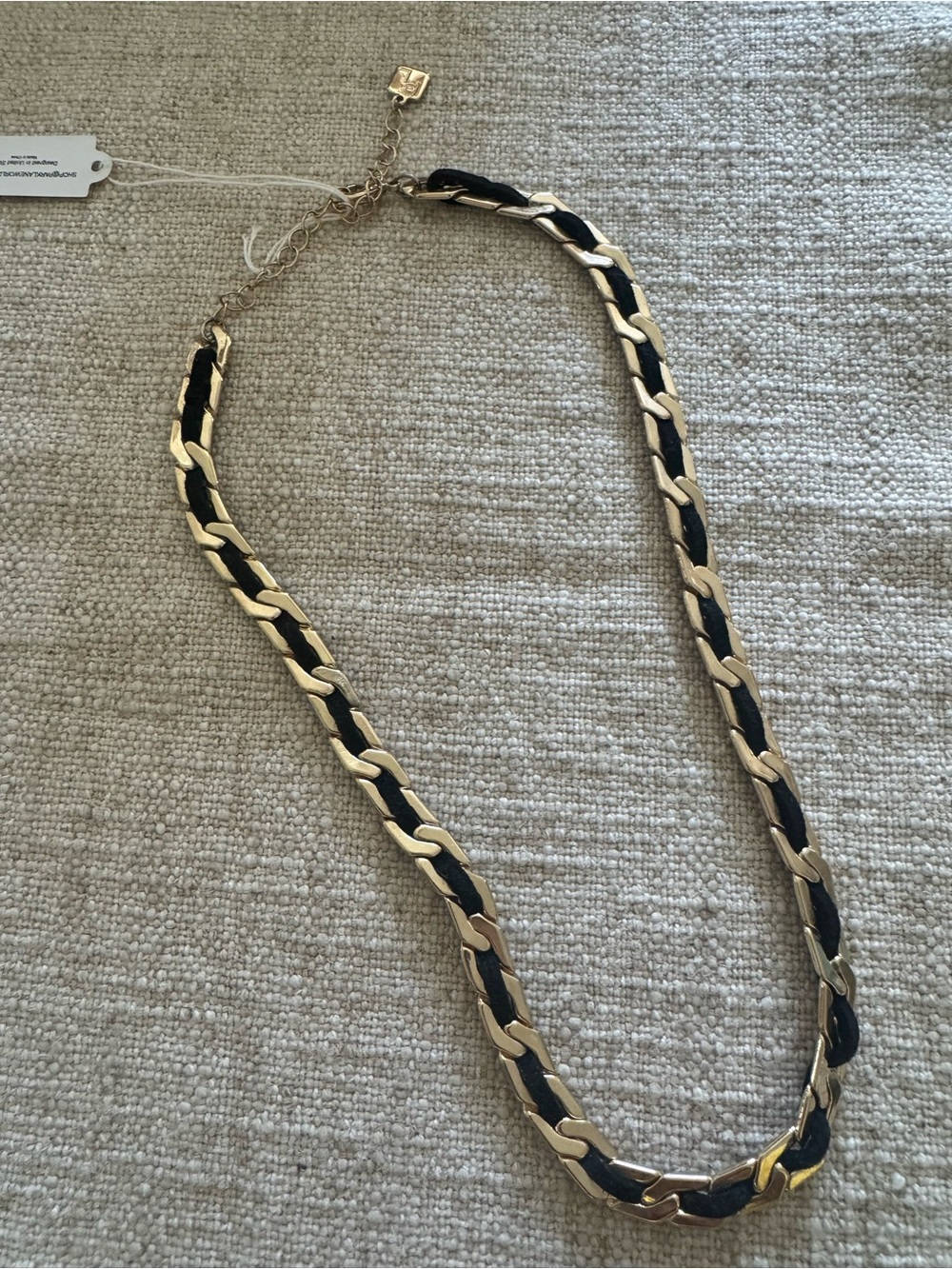 Park Lane Mademoiselle black suede and gold necklace.